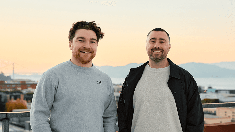 Solidroad's founders on a rooftop in San Francisco at sunset